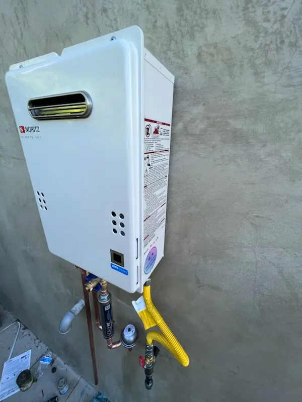 Tankless water heater installation for Bryan Hill Manor homes